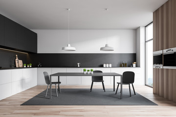 White and gray kitchen interior, wooden cupboard