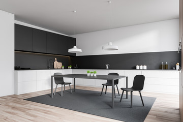 White and gray kitchen corner with table