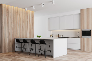 Wooden and white kitchen corner, counters and bar