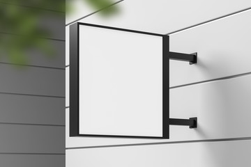 Square mock up sign on white building wall