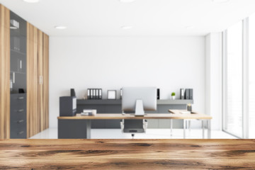 Blurred white and wooden CEO office interior