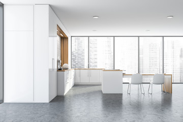 Spacious panoramic white kitchen interior