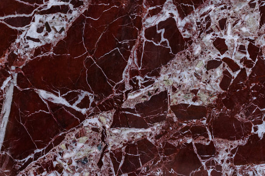 The finishing stone. The polished red marble. Texture.