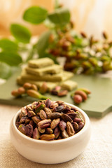 Sweet, delicate and fragrant nuts, Bronte pistachios with  brilliant green colour, ingredient for Italian cuisine, ice creams, cakes, pesto