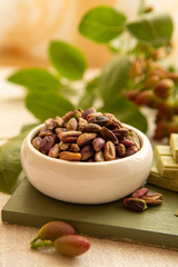 Sweet, delicate and fragrant nuts, Bronte pistachios with  brilliant green colour, ingredient for Italian cuisine, ice creams, cakes, pesto