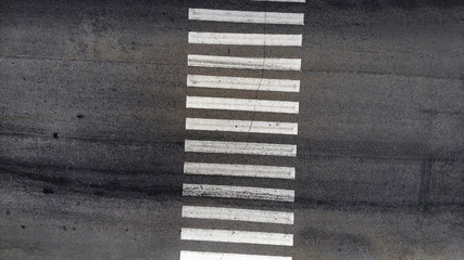 Pedestrian crosswalk zebra with no people, aerial, top view