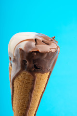 chocolate vanilla ice cream on blue  background