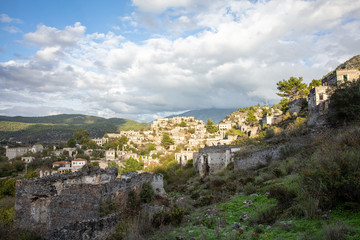 Ruins at the former Greek village of Kayakoy in Turkey, abandoned 1922, now a museum and also known...