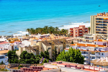 The Mediterranean Sea behind the buildings of Torremolinos, Province of Malaga, Andalusia, Spain, elevated view from the Parque de la Bateria observation tower