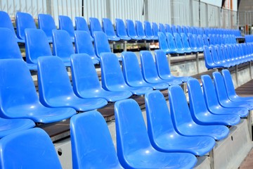 rows of empty seats in stadium