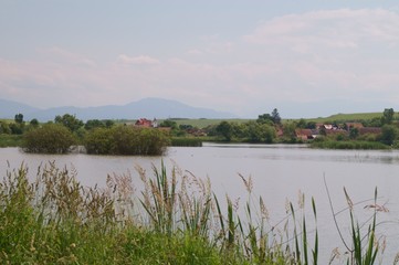 Obraz premium Beautiful scenery of lake in Rotbav, Brasov, Transylvania, Romania