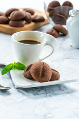 Coffee bean cookies with espresso coffee in a cup