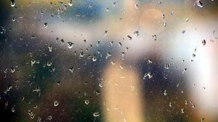 raindrops on dirty glass