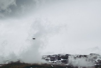 Drone flying over the territory of Kirkjufellsfoss in Iceland.