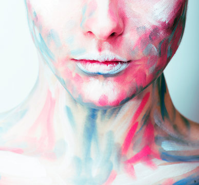 young woman with creative make up like painted oil picture on face