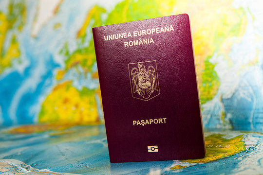 Passport on map. Travel to Europe Preparation for Traveling concept. An official passport of Romania