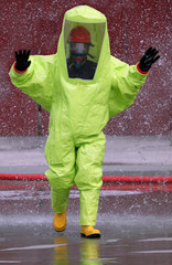 man with yellow protective suit