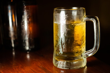 glass of beer with water drop