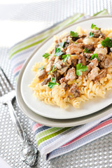 Spiral pasta with morel mushrooms on a plate