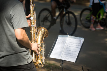 Street musician playing saxophone