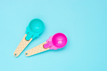 Scoop  for ice-cream on color background