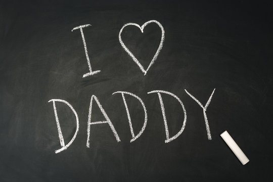 Phrase I love daddy on chalk board
