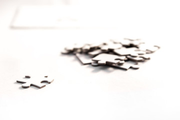 the rigth solution, white jigsaw/puzzle whit one gap, symbol of problem solving