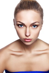 Fototapeta premium Portrait of young beautiful girl with long blond hair and natural make-up