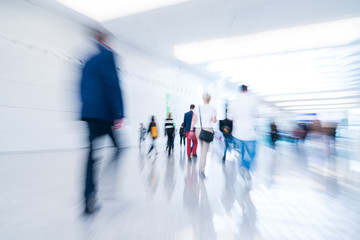 blurred people at a trade fair