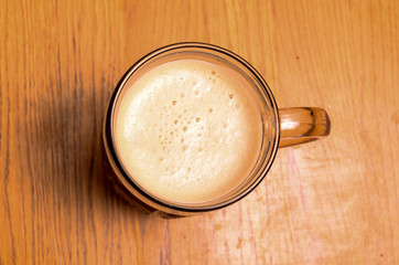 mug of beer on dark background