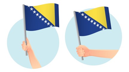 Bosnia and Herzegovina flag in hand icon