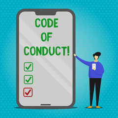 Text sign showing Code Of Conduct. Business photo text Follow principles and standards for business integrity Man Presenting Huge Blank Screen Smartphone while Holding Another Mobile