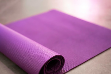 Purple Rolled Yoga Mat