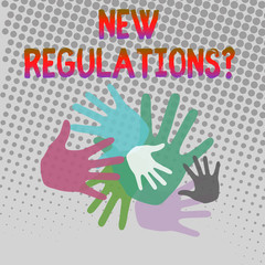 Writing note showing New Regulations Question. Business concept for rules made government order control way something is done Hand Marks of Different Sizes for Teamwork and Creativity