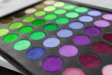 Makeup eyeshadow palette. Multicolored palette of shadows. Eyeshadow palette with top colors for makeup.