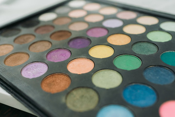 Makeup eyeshadow palette. Multicolored palette of shadows. Eyeshadow palette with top colors for makeup.