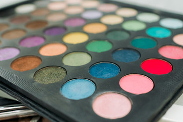 Makeup eyeshadow palette. Multicolored palette of shadows. Eyeshadow palette with top colors for makeup.