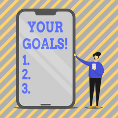 Writing note showing Your Goals. Business concept for something that you hope to achieve or get in near or far future Man Presenting Huge Smartphone while Holding Another Mobile