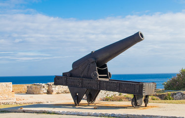 An old cannon  overlooking Havana, Cuba harbor