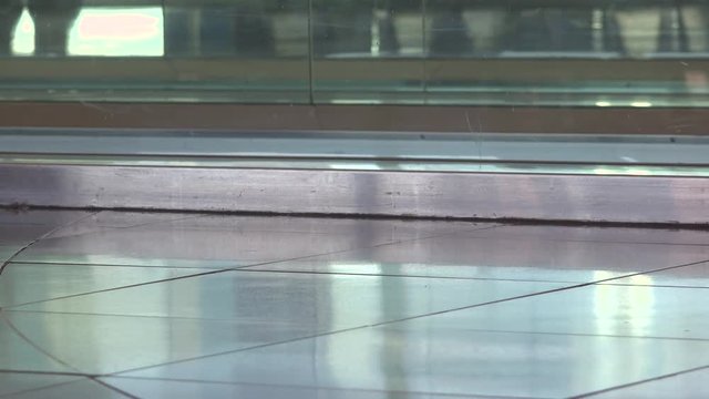 People on moving walkway at airport 4k