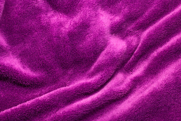 Fototapeta na wymiar purple towel sheets with copy-space.