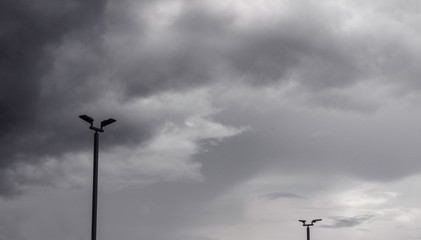 Dark gray dramatic sky with large clouds before rain.