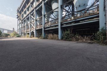 Asphalt concrete flooring and factory buildings