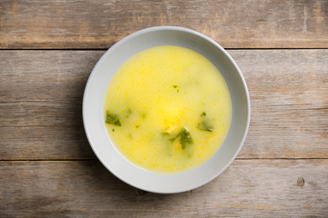 Hot pea soup with spices on the rustic background. Selective focus. Shallow depth of field.