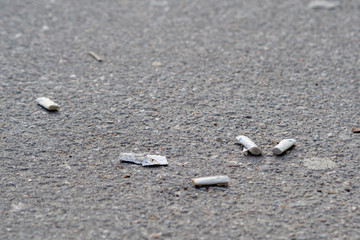 Butts on the street on asphalt