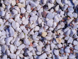 White pebble stone texture on the ground