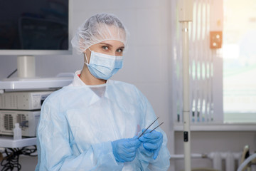 Nurse preparing tools.