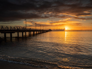 Obraz premium Pier Sunrise with Beautiful Sky