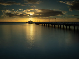 Obraz premium Pier Sunrise with Beautiful Sky