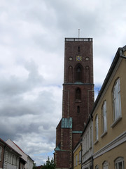 Fototapeta na wymiar Tower of Ribe Cathedral, Denmark viewed on cloudy day
